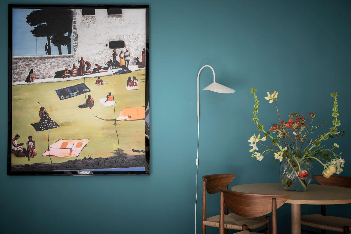 A Teal Green Living Room and Large Windows in a Swedish Apartment 8 teal wall color detail