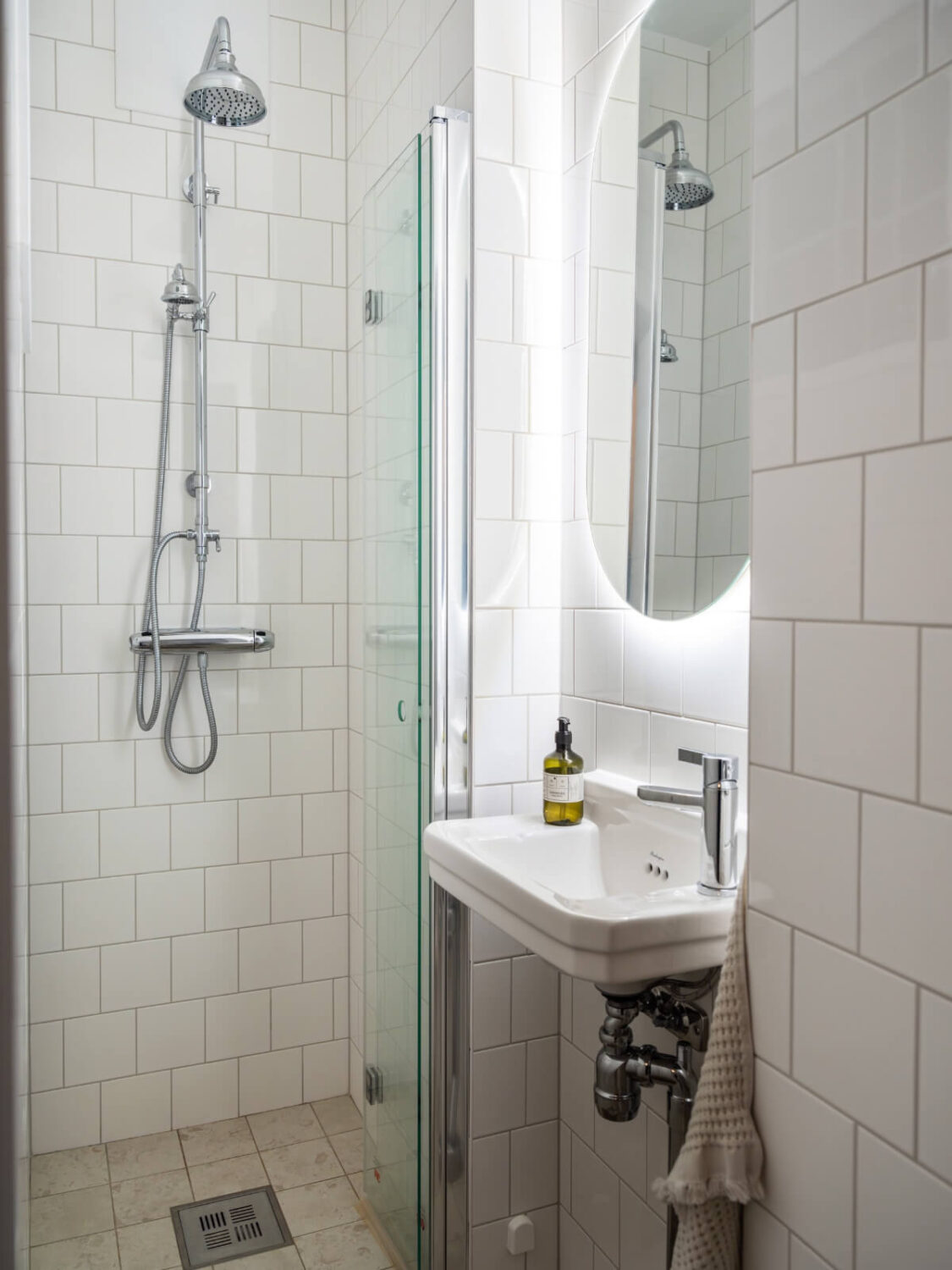 A Cozy, Tiny Apartment with a Golden Yellow Bedroom 18 tiny bathroom white tiles