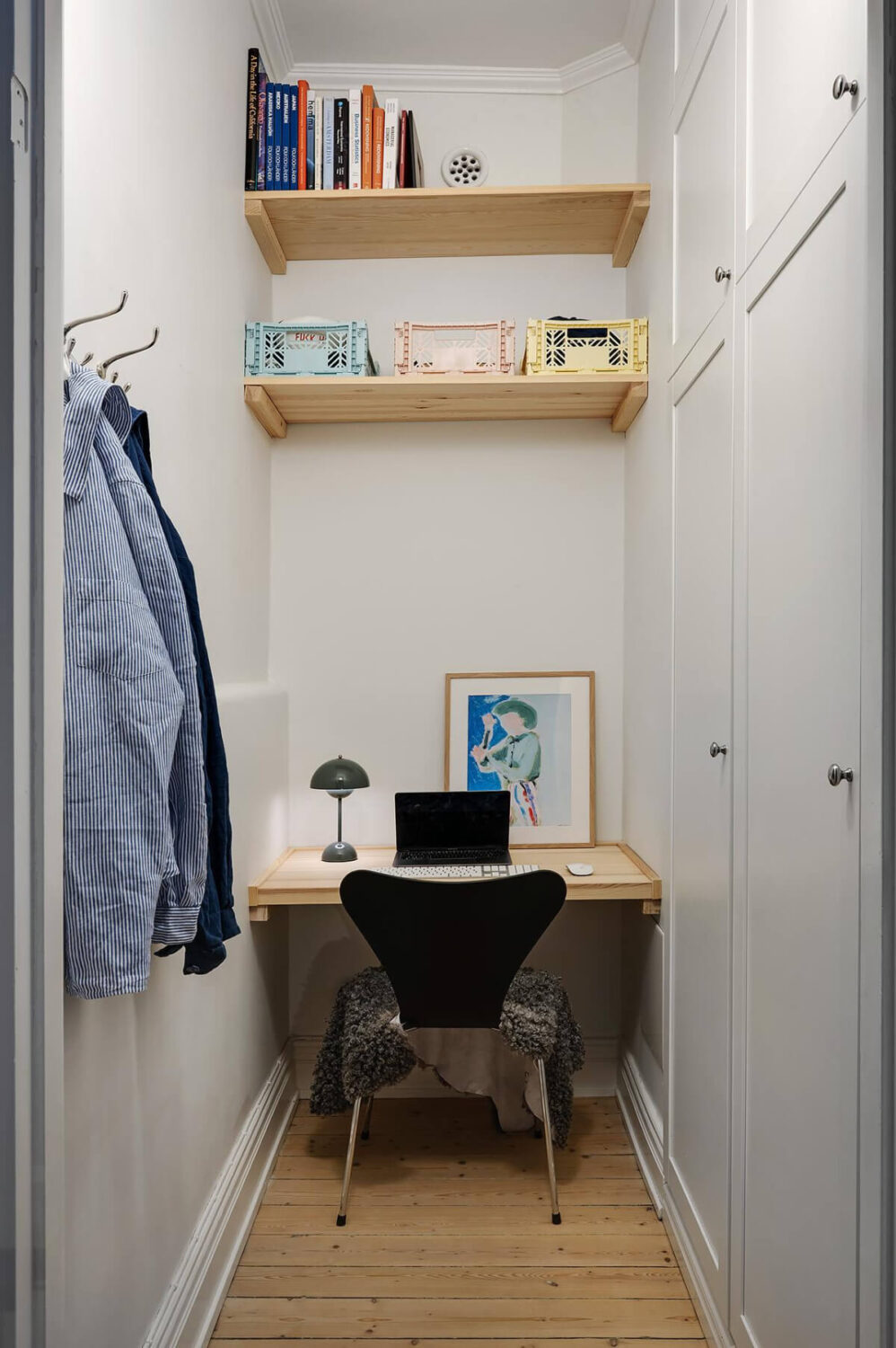 Classic Elements in a Charming Swedish Studio Apartment 10 tiny-home-office-wooden-floating-desk-built-in-wardrobes
