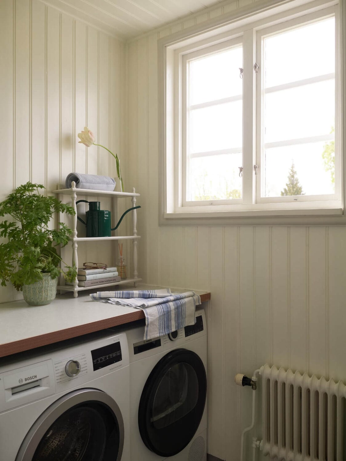 Light-Filled Rooms and Wallpapers in a Swedish Country House 13 utility room paneled walls