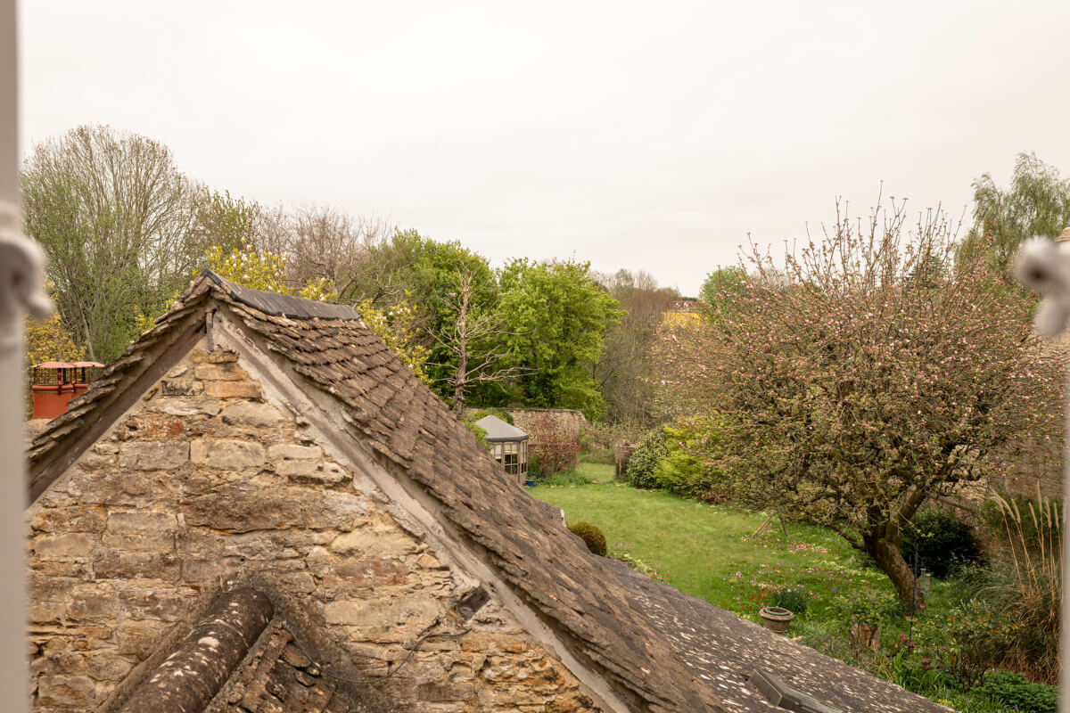 White-Washed Walls and Rustic Elements in a 17th Century Townhouse 29 view from window