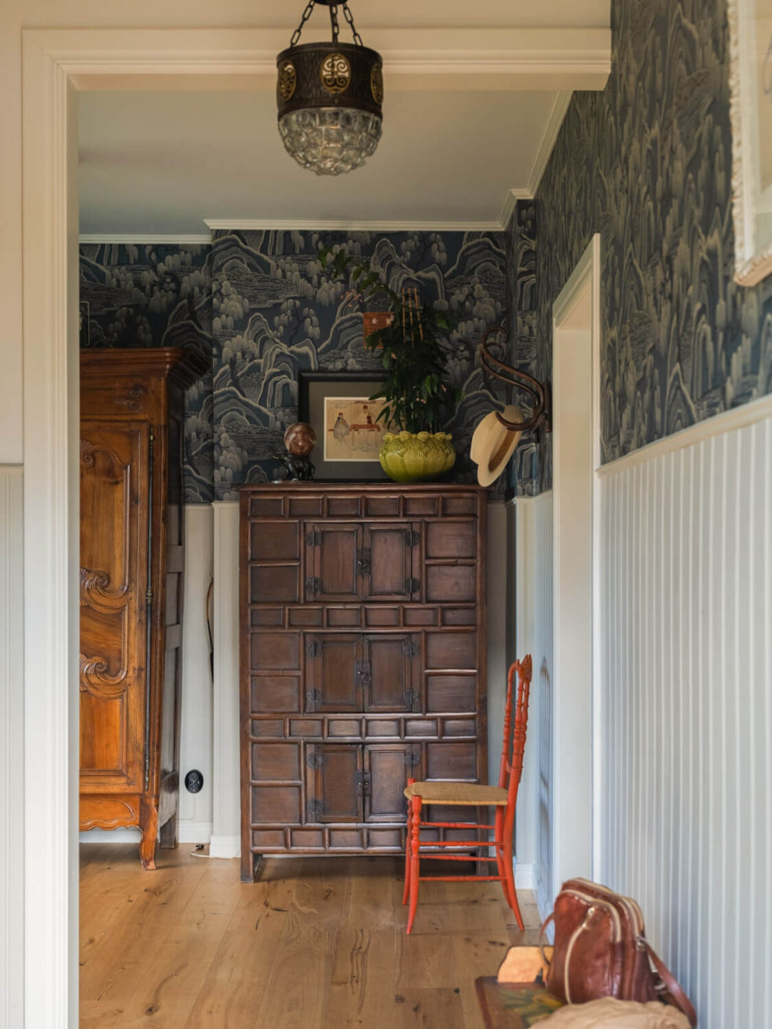 An Early 20th-Century Family Home Decorated with Color and Art 31 wallpaper and paneling hallway