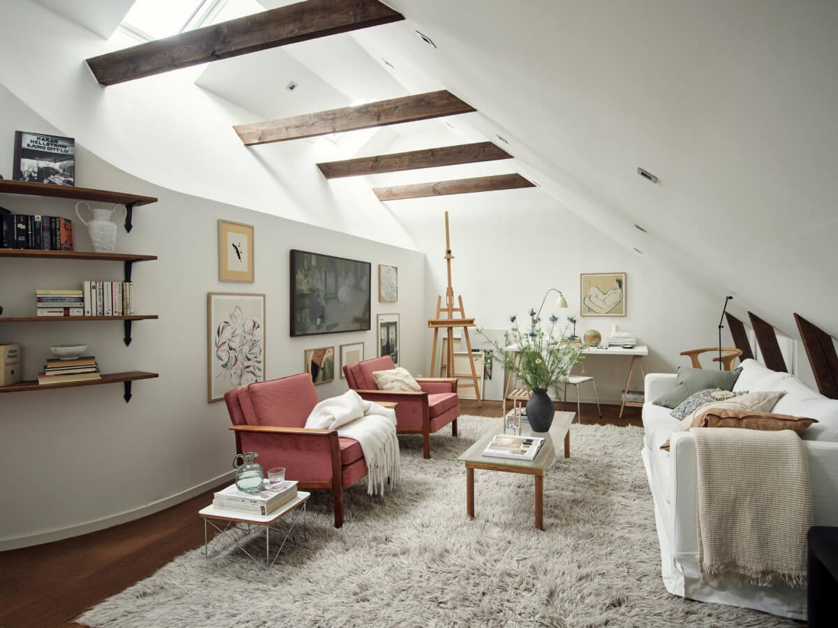 A Harmonious Color Palette in a Swedish Duplex Apartment 25 white attic room exposed beams skylight