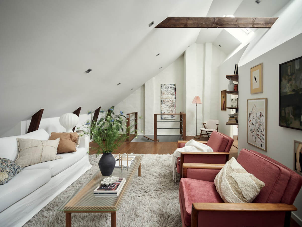 A Harmonious Color Palette in a Swedish Duplex Apartment 26 white attic room wooden beams