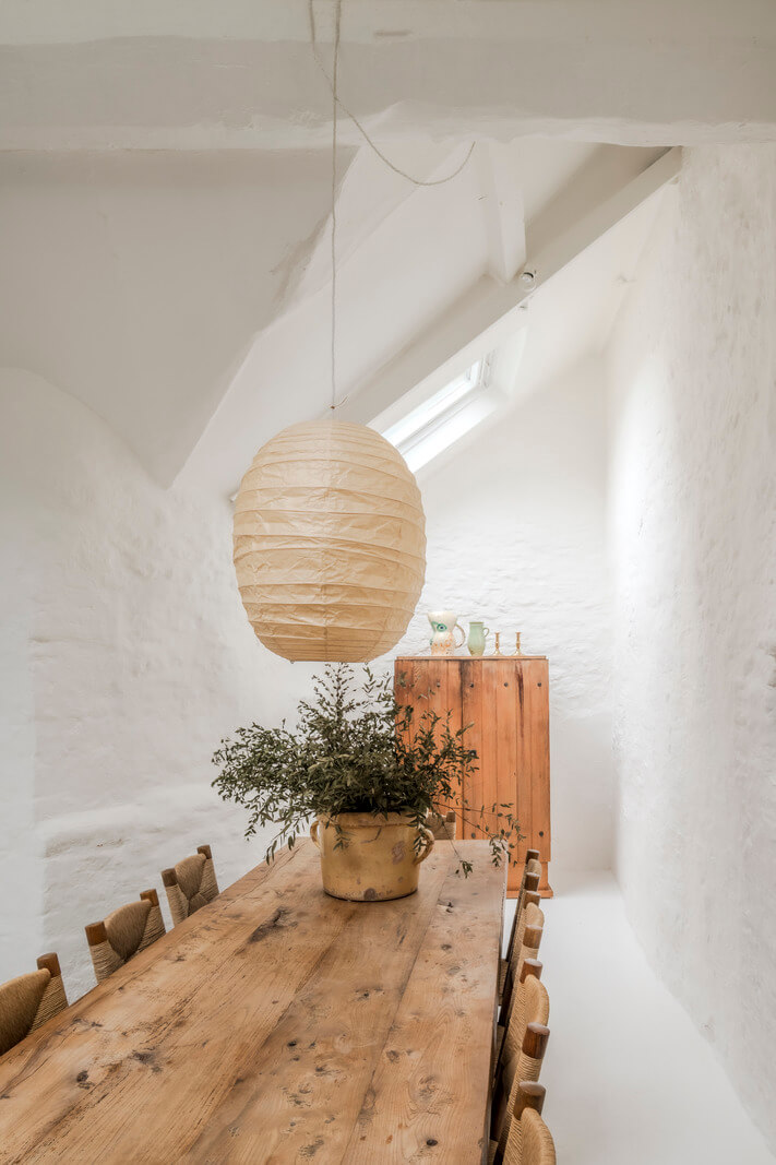 White-Washed Walls and Rustic Elements in a 17th Century Townhouse 10 white-dining-room-high-ceiling-skylight-large-wooden-table