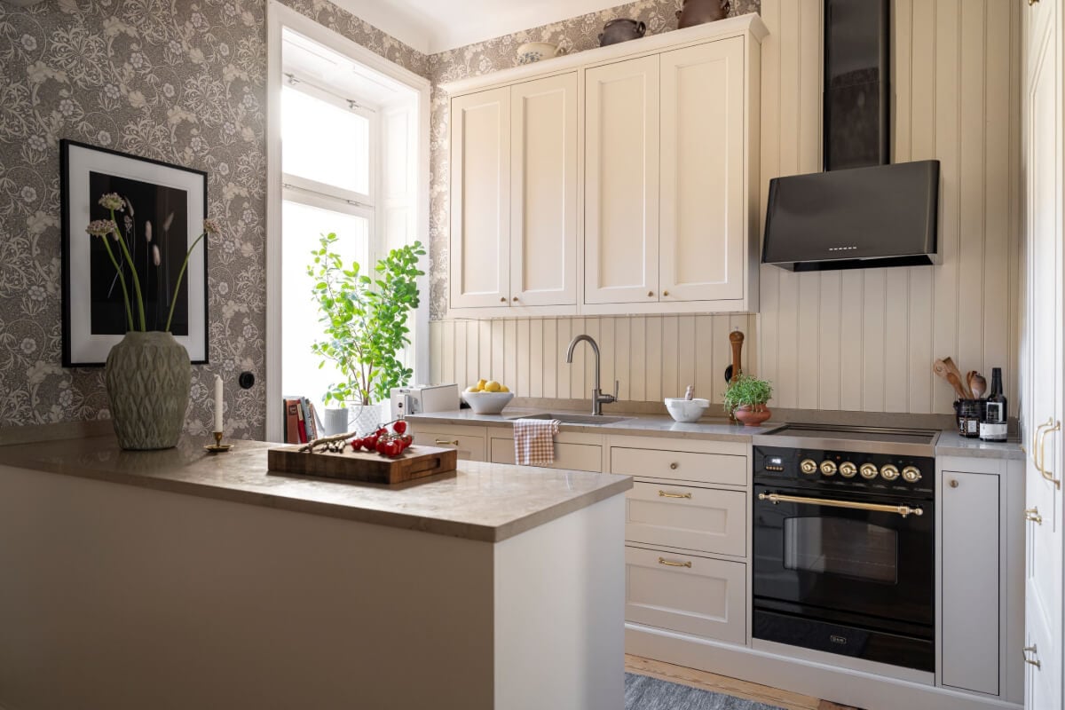 Wallpapers and Blue Tones in a Cozy Turn-of-the-Century Home 10 white kitchen brass handles floral wallpaper