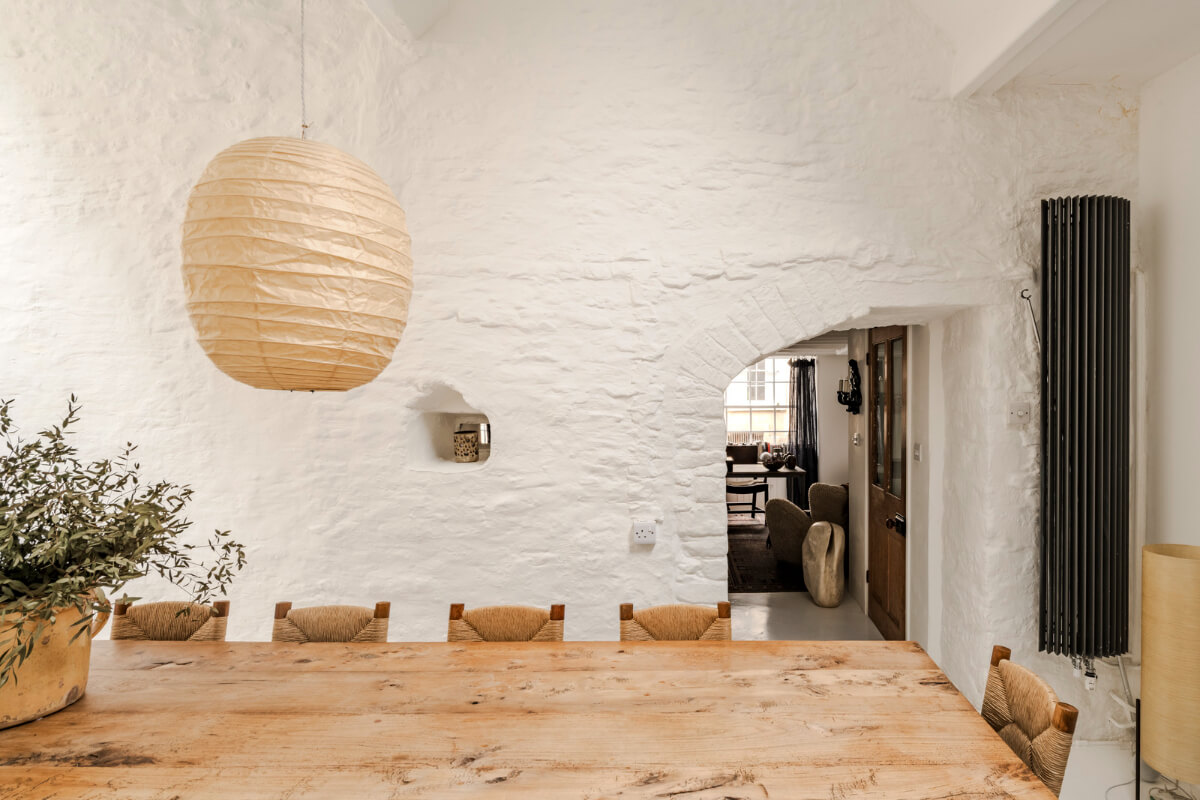 White-Washed Walls and Rustic Elements in a 17th Century Townhouse 9 white painted brick walls dining room