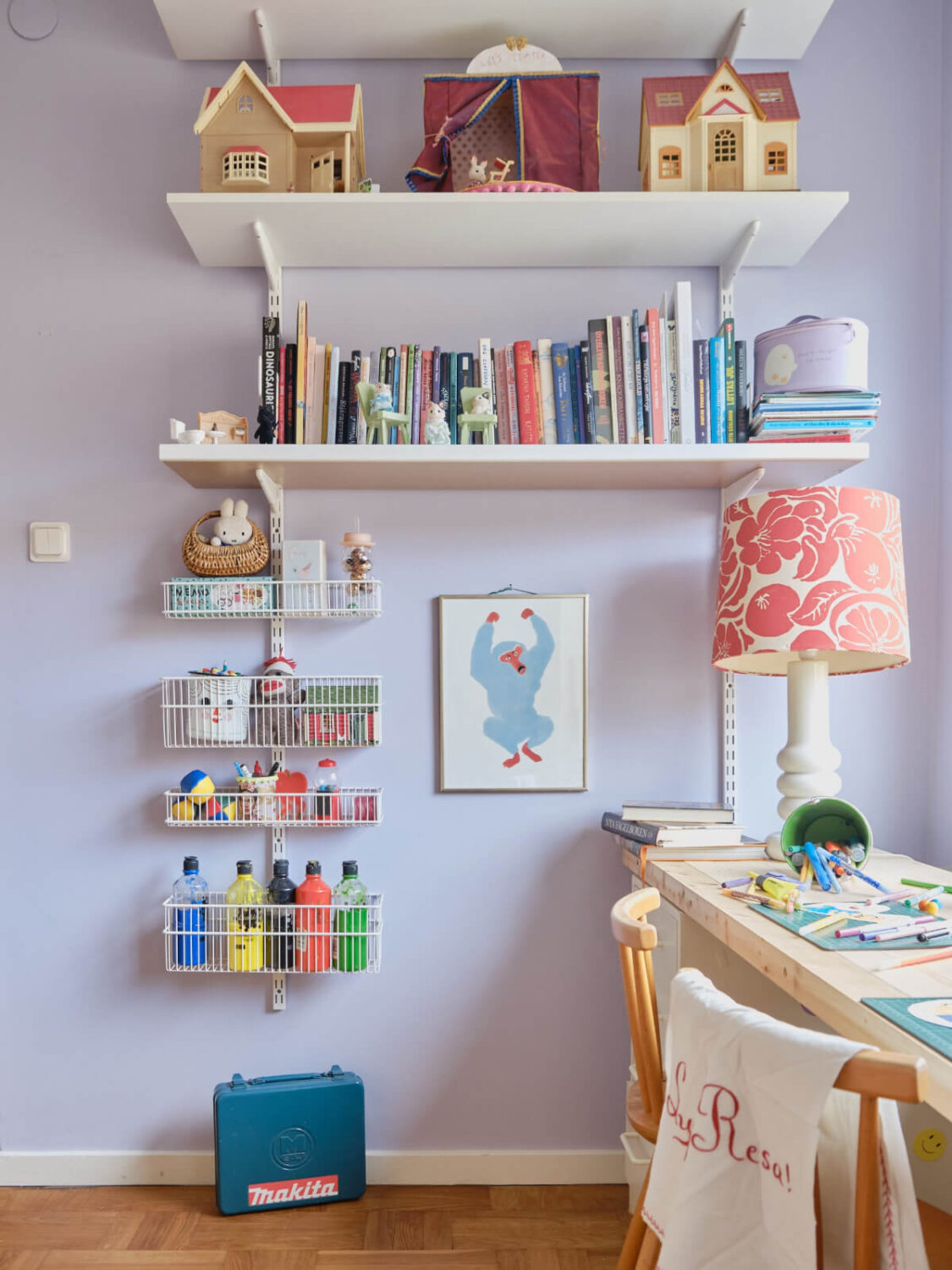 A Colorful 1940s Apartment with Original Elements 23 wooden desk and shelves kids bedroom purple walls