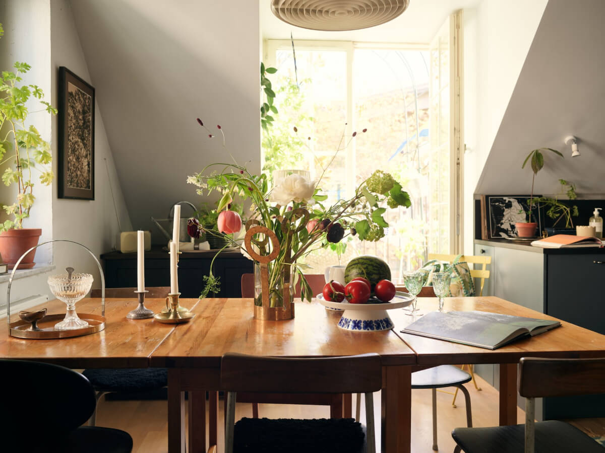 A Stunning Top-Floor Apartment with High Ceilings in a Former Church 5 wooden dining table