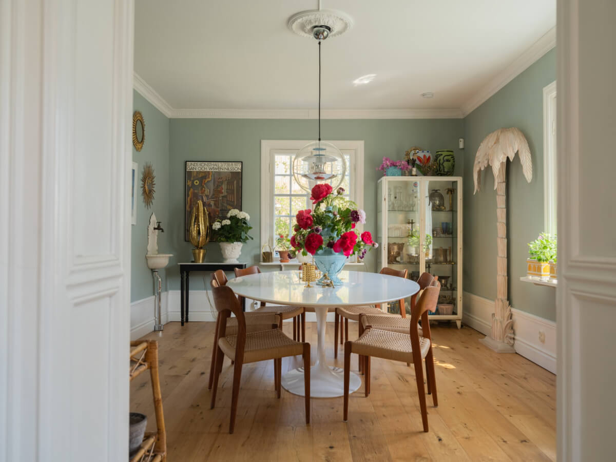 An Early 20th-Century Family Home Decorated with Color and Art 9 wooden doors dining room