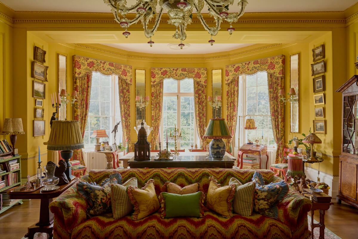 Pattern, Color, and Character in a Historic Country House Apartment 1 yellow living room period home bay with large windows