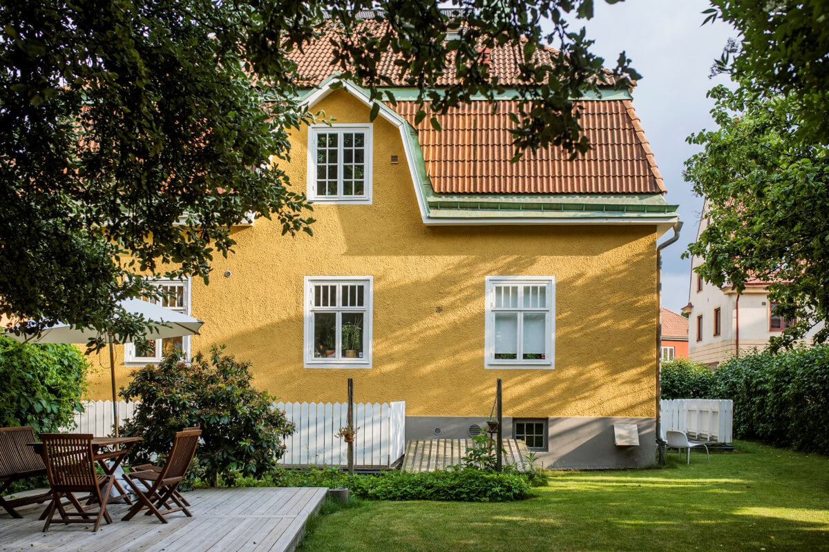 A Stylish Basement Apartment with a Private Terrace 25 yellow swedish house communal garden
