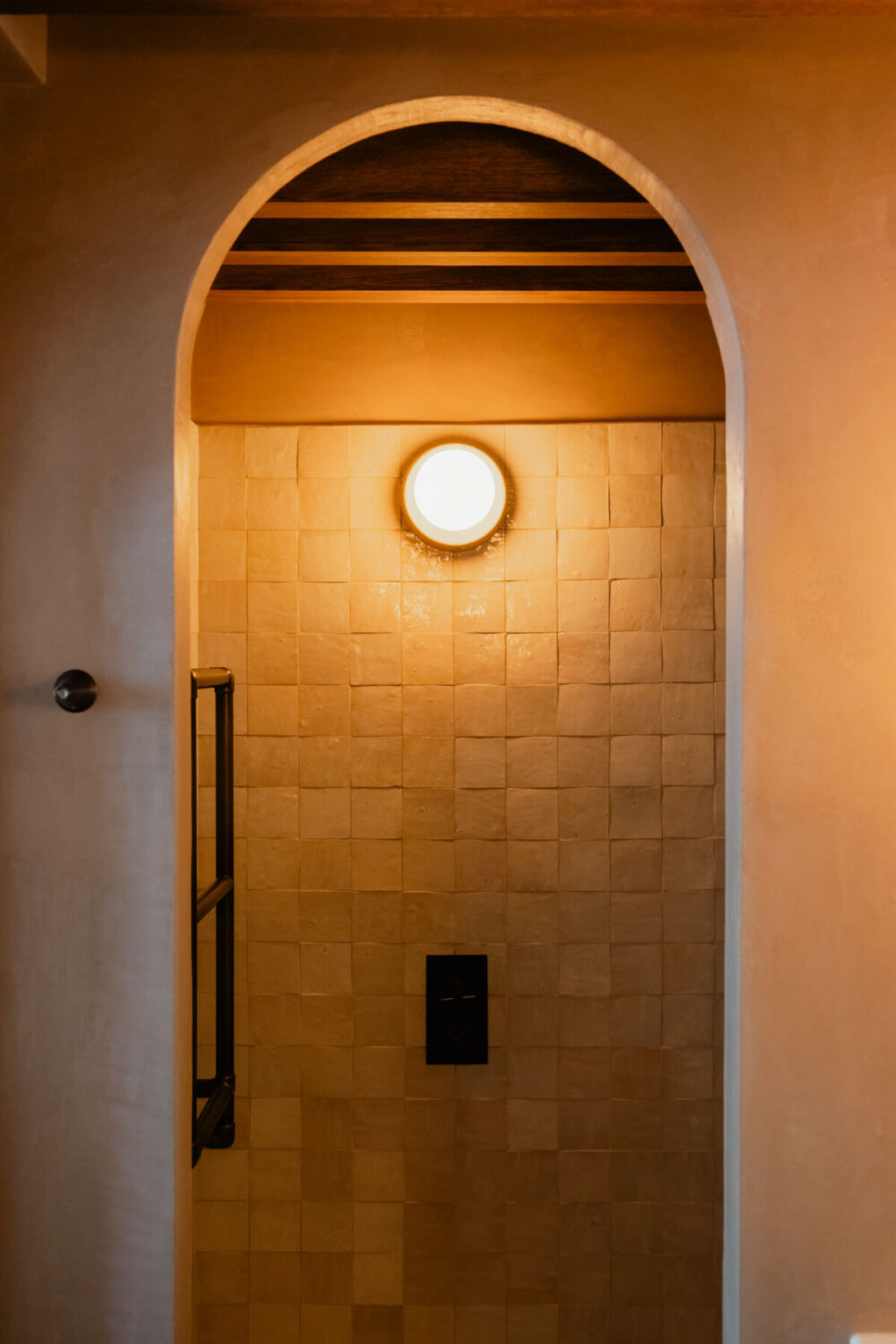 High Ceilings and Bespoke Design in a Stylish London Apartment 32 arched shower entry zellige tiles