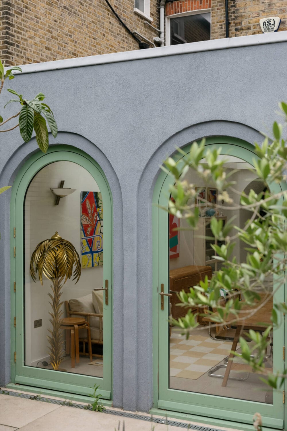A Victorian Family House with a Tuscan-Inspired Kitchen Extension 16 arched windows kitchen extension