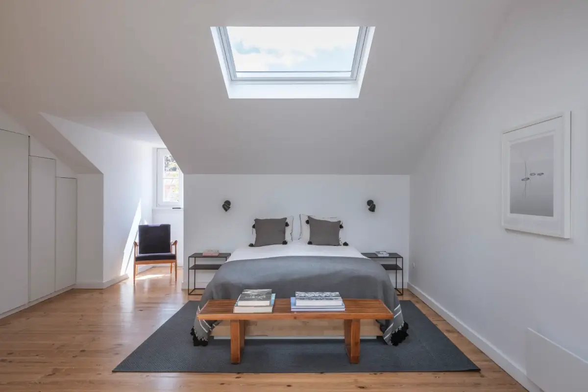 A Light-Filled Duplex Apartment in a Classical Lisbon Building 11 attic bedroom large skylight