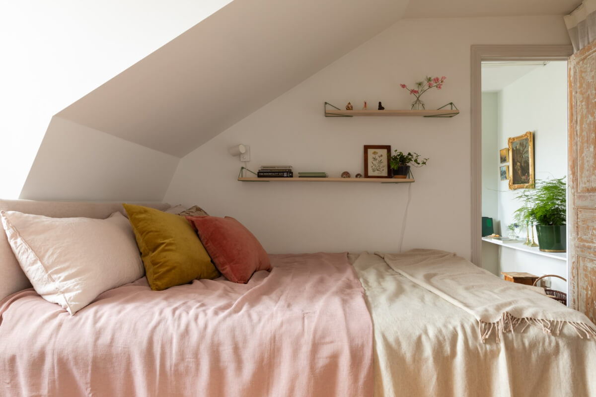 Antiques and Modern Additions in a Cozy Top Floor Duplex Apartment 25 attic bedroom shelves
