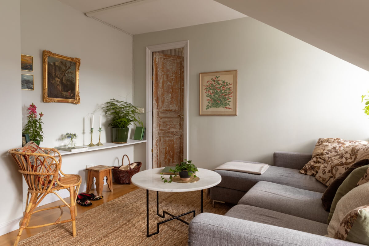 Antiques and Modern Additions in a Cozy Top Floor Duplex Apartment 20 attic floor living space jute rug