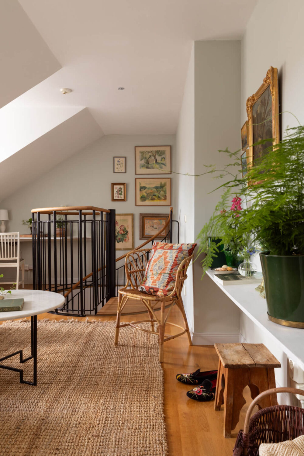 Antiques and Modern Additions in a Cozy Top Floor Duplex Apartment 18 attic-floor-slanted-ceiling