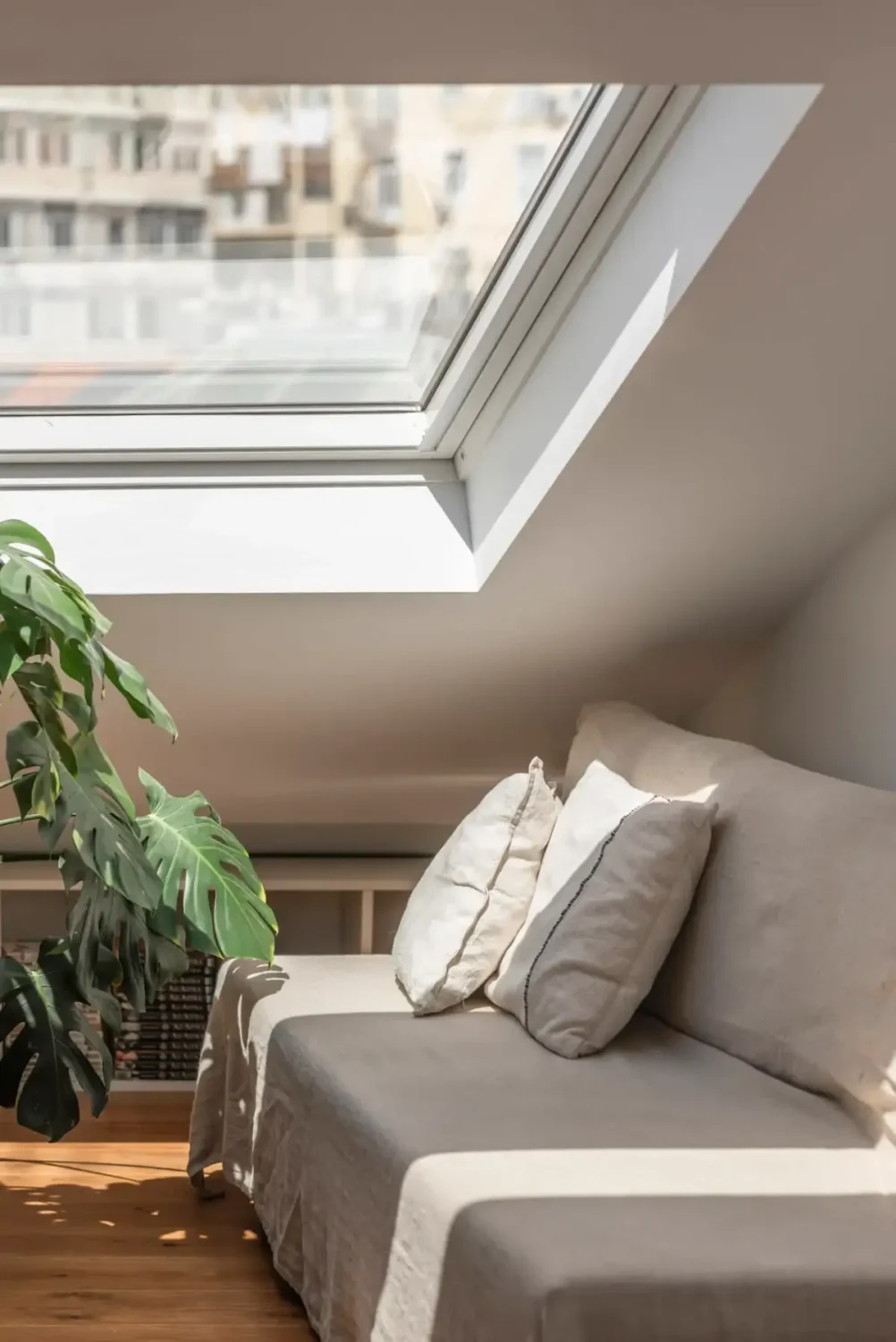 A Light-Filled Duplex Apartment in a Classical Lisbon Building 12 attic room skylight