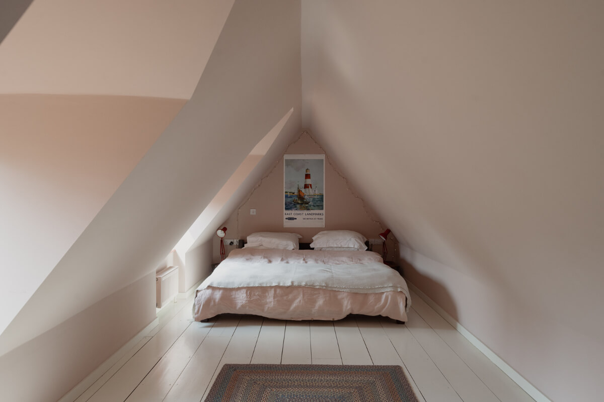 Colorful Interiors and Period Features in a 16th-Century Farmhouse 24 attic room wide wooden floorboards