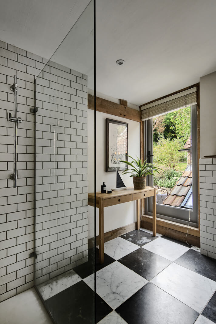 Unique Rooms and Historic Splendor in a Medieval English Country House 20 bathroom black and white marble checkerboard floor