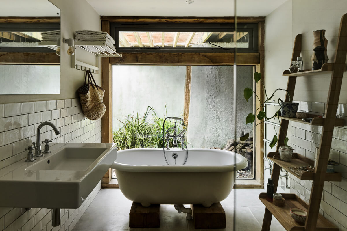 Unique Rooms and Historic Splendor in a Medieval English Country House 15 bathroom freestanding bath large window
