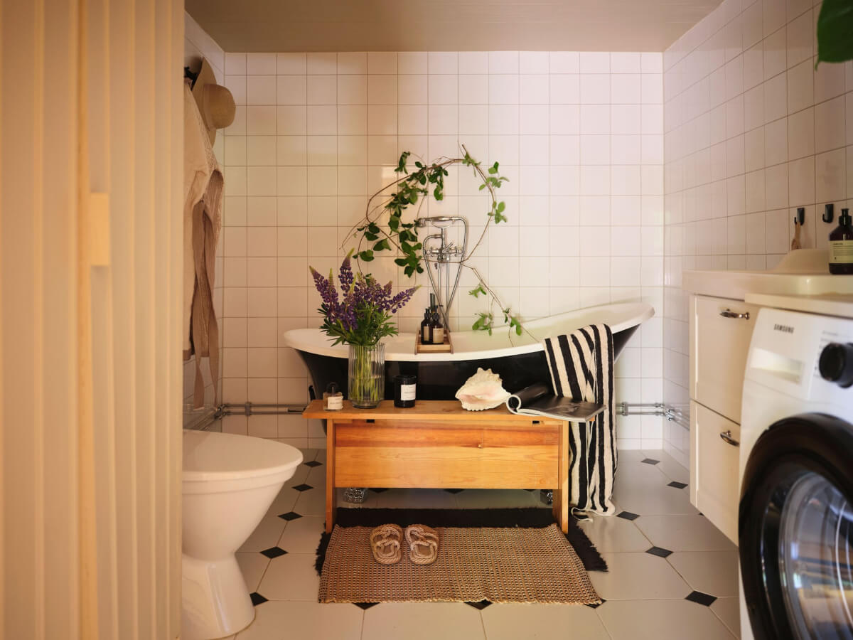 A Charming, Extended 19th-Century Log House in Sweden 32 bathroom freestanding bath painted ceiling