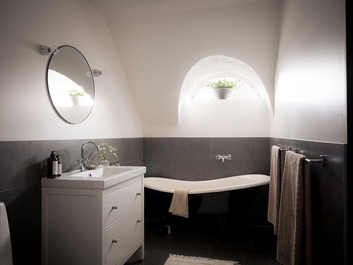 A Floral Painted Ceiling in a 1920s Family Home in Sweden 33 bathroom freestanding bath small window