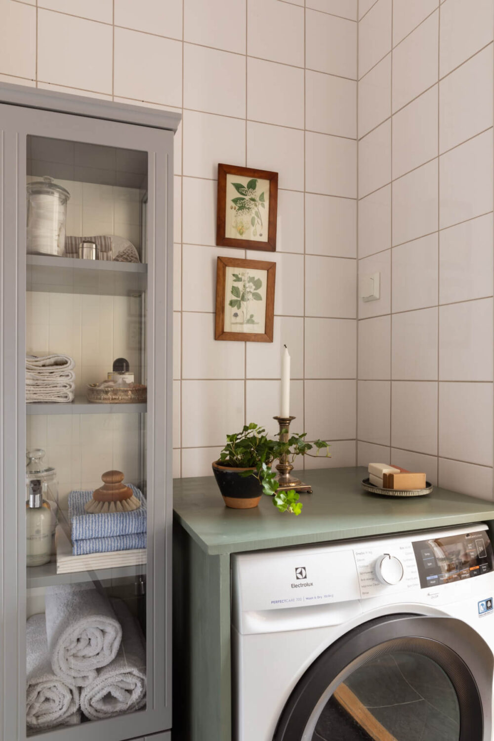 Antiques and Modern Additions in a Cozy Top Floor Duplex Apartment 28 bathroom glass cabinet