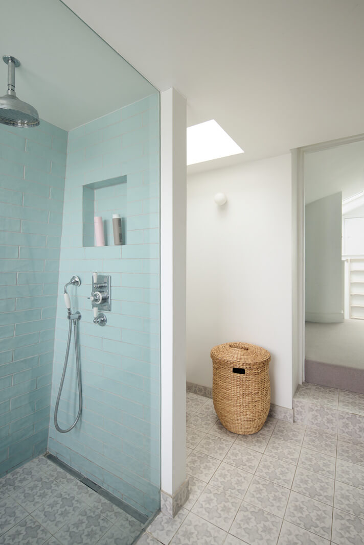 Light-Filled Interiors in a Grand Early Victorian House in Notting Hill 30 bathroom light blue shower tiles