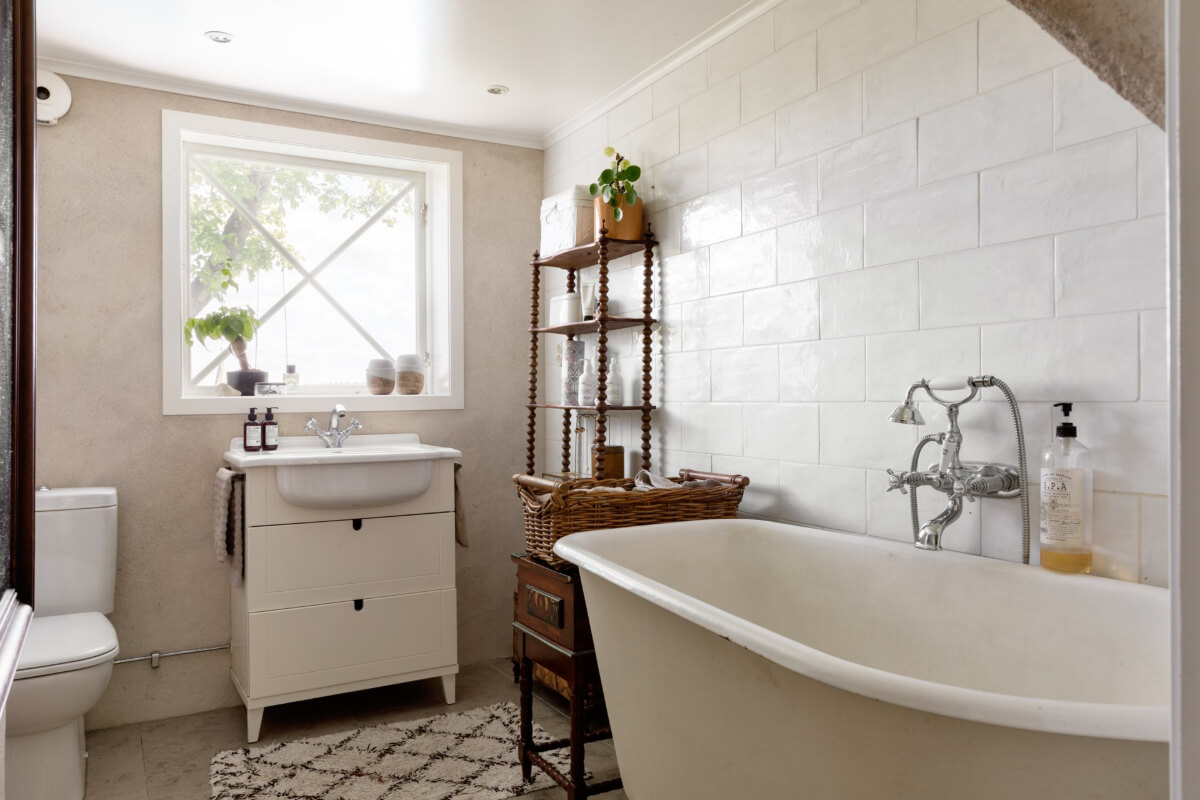 An Idyllic 18th Century Cottage with a Charming Garden 26 bathroom white tiles freestanding bath