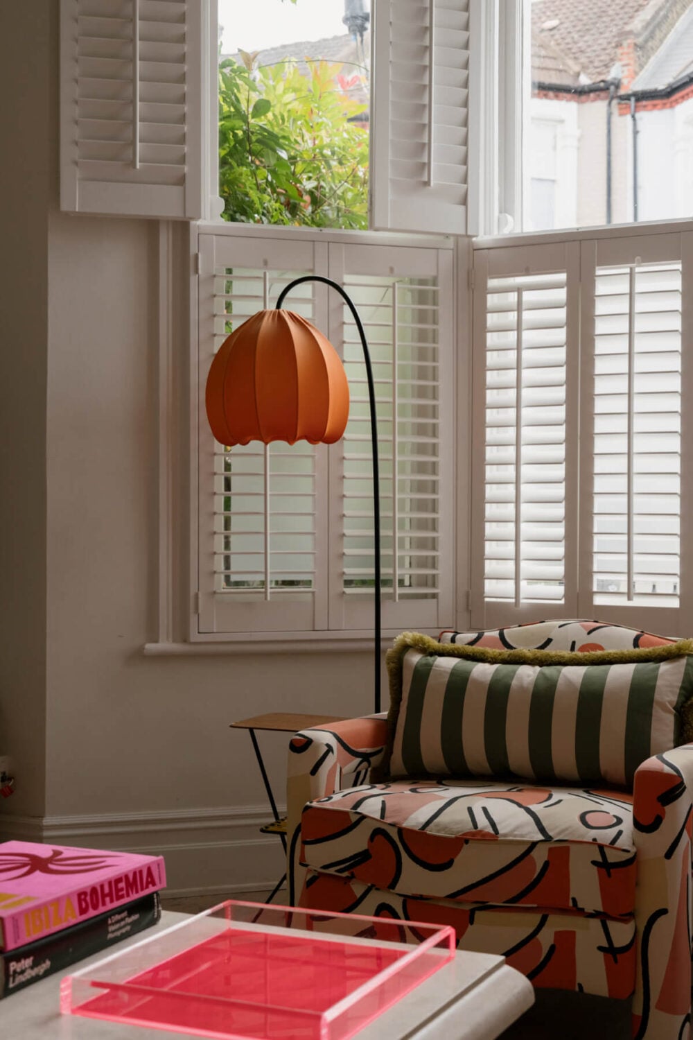 A Victorian Family House with a Tuscan-Inspired Kitchen Extension 3 bay window patterned armchair