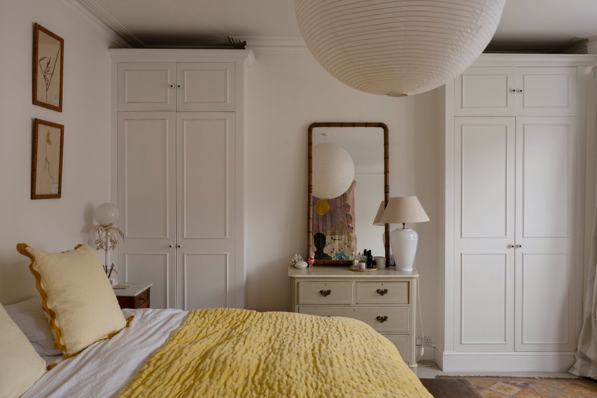 A Victorian Family House with a Tuscan-Inspired Kitchen Extension 22 bedroom built-in wardrobes yellow bed spread