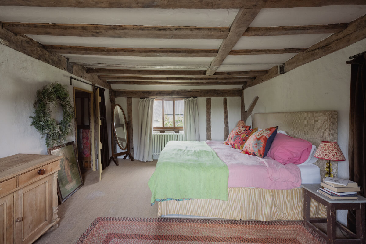 Colorful Interiors and Period Features in a 16th-Century Farmhouse 22 bedroom exposed beams