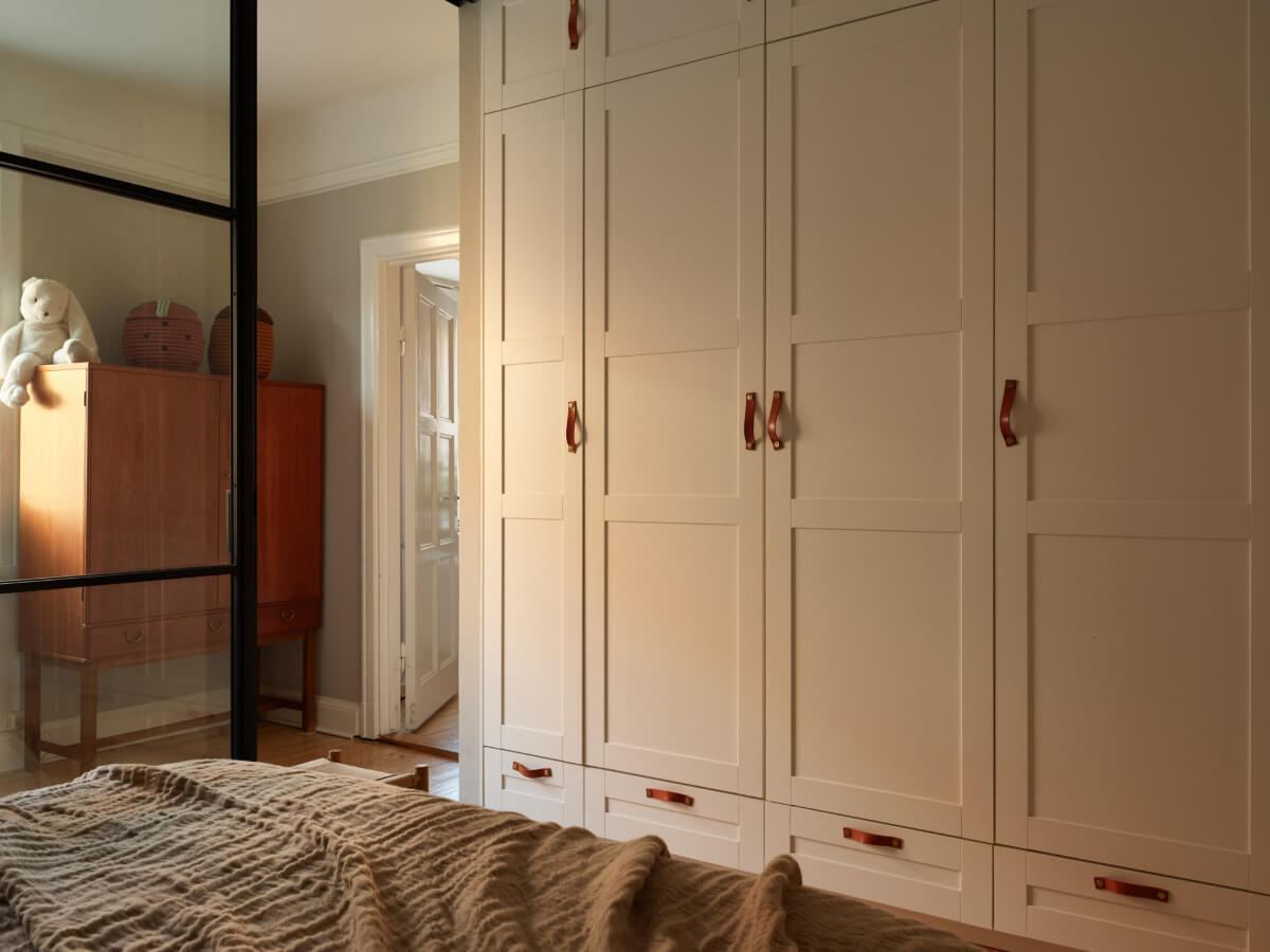 Historic Charm and an Industrial Glass Wall in a Stockholm Apartment 20 bedroom wardrobes