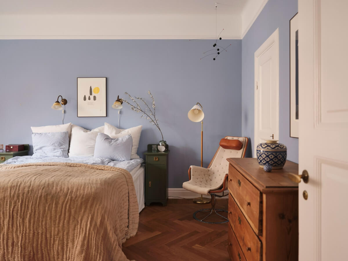 An Early 20th Century Apartment with a Muted Green Kitchen 14 blue bedroom parquet floor