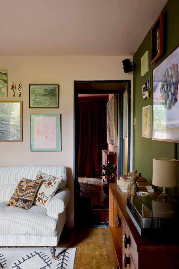 Cozy Living Spaces and Limewash Walls in an Artist's English Home 9 blue doorframe