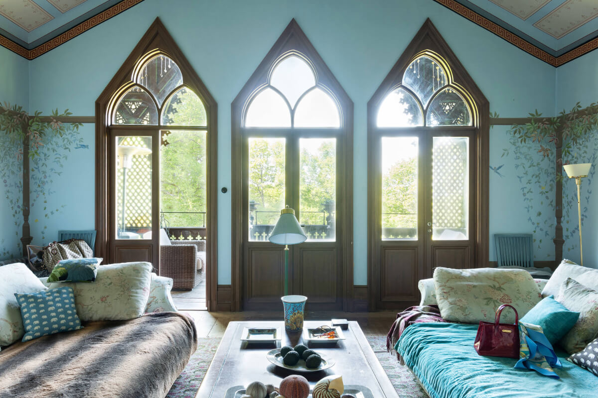 A Grand Historical Swedish Villa with Views of a Royal Castle 7 blue sitting room gothic windows decorative painted walls