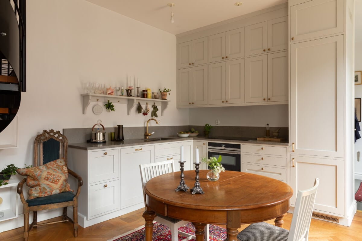 Antiques and Modern Additions in a Cozy Top Floor Duplex Apartment 13 classic kitchen double row upper cabinets