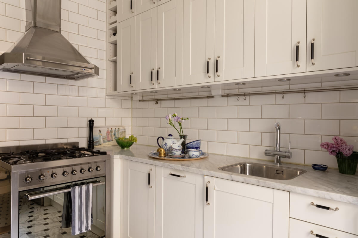 A Classic Late 19th-Century Apartment with a Private Courtyard Terrace 19 classic white kitchen metro tiles