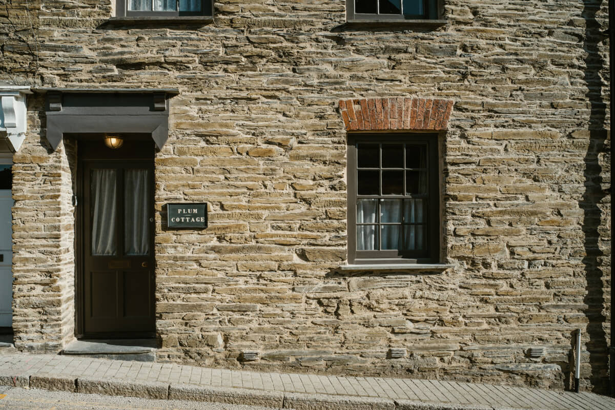Bespoke Interiors and an Earthy Color Palette in a Historic Cottage 25 cottage exterior