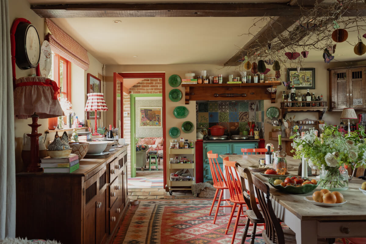 Colorful Interiors and Period Features in a 16th-Century Farmhouse 6 cozy kitchen colorful details large table