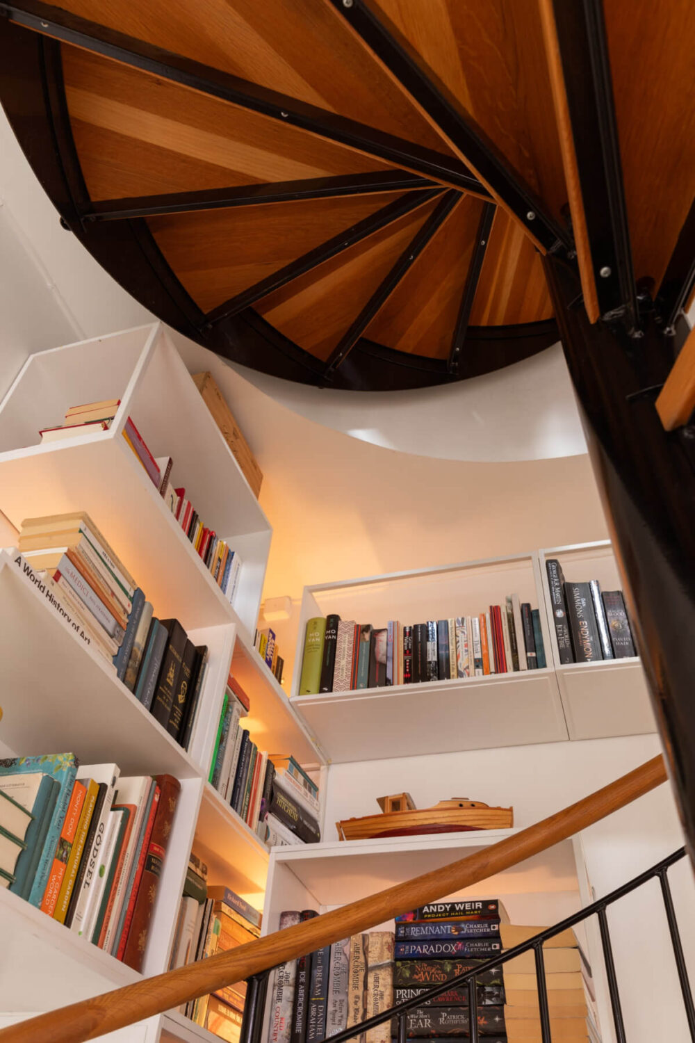 Antiques and Modern Additions in a Cozy Top Floor Duplex Apartment 5 custom bookcases