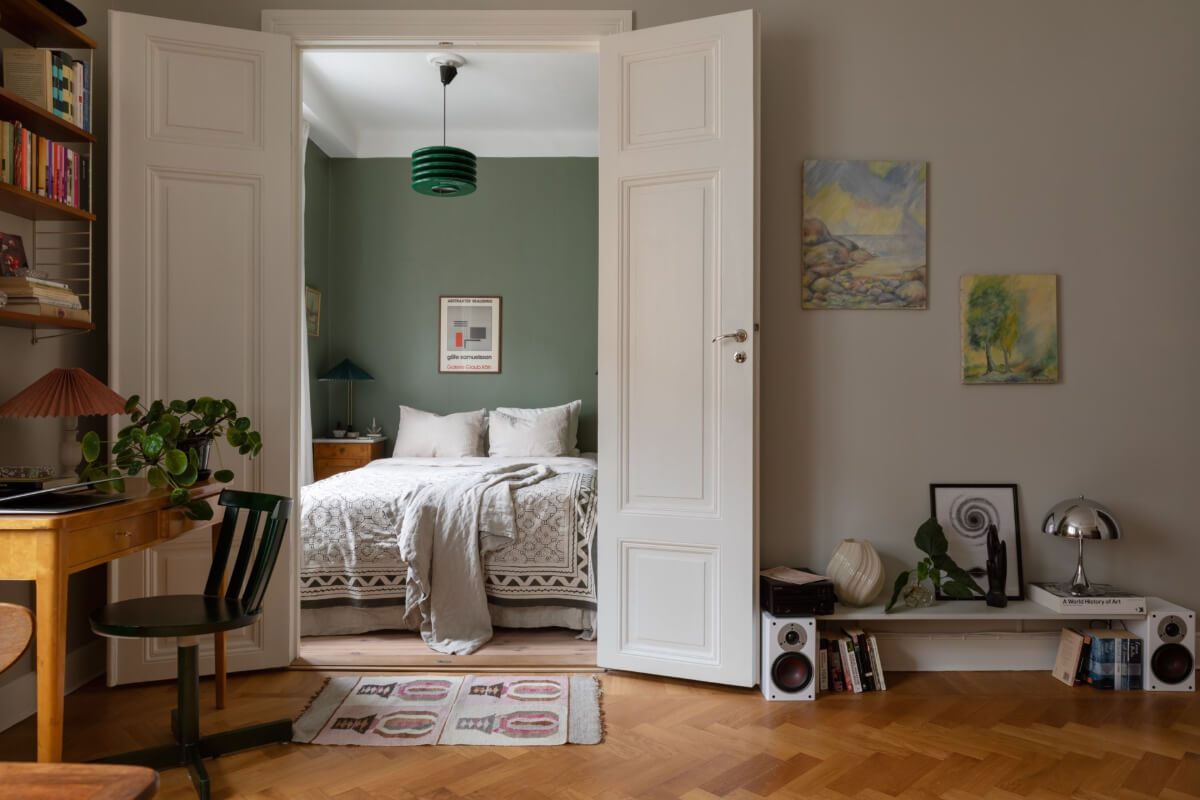 A Nice Color Palette and Original Elements in a Cozy 1930s Apartment 6 double doors to bedroom