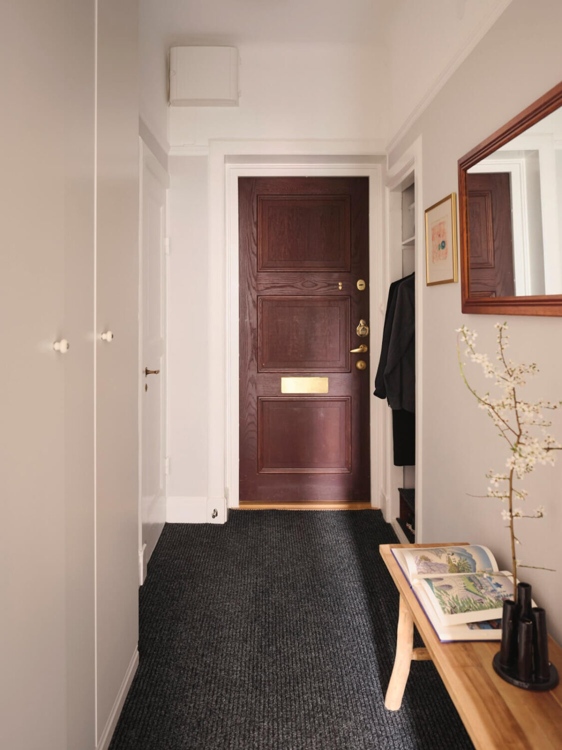 An Early 20th Century Apartment with a Muted Green Kitchen 22 entry hall built in wardrobes An Early 20th Century Apartment with a Muted Green Kitchen
