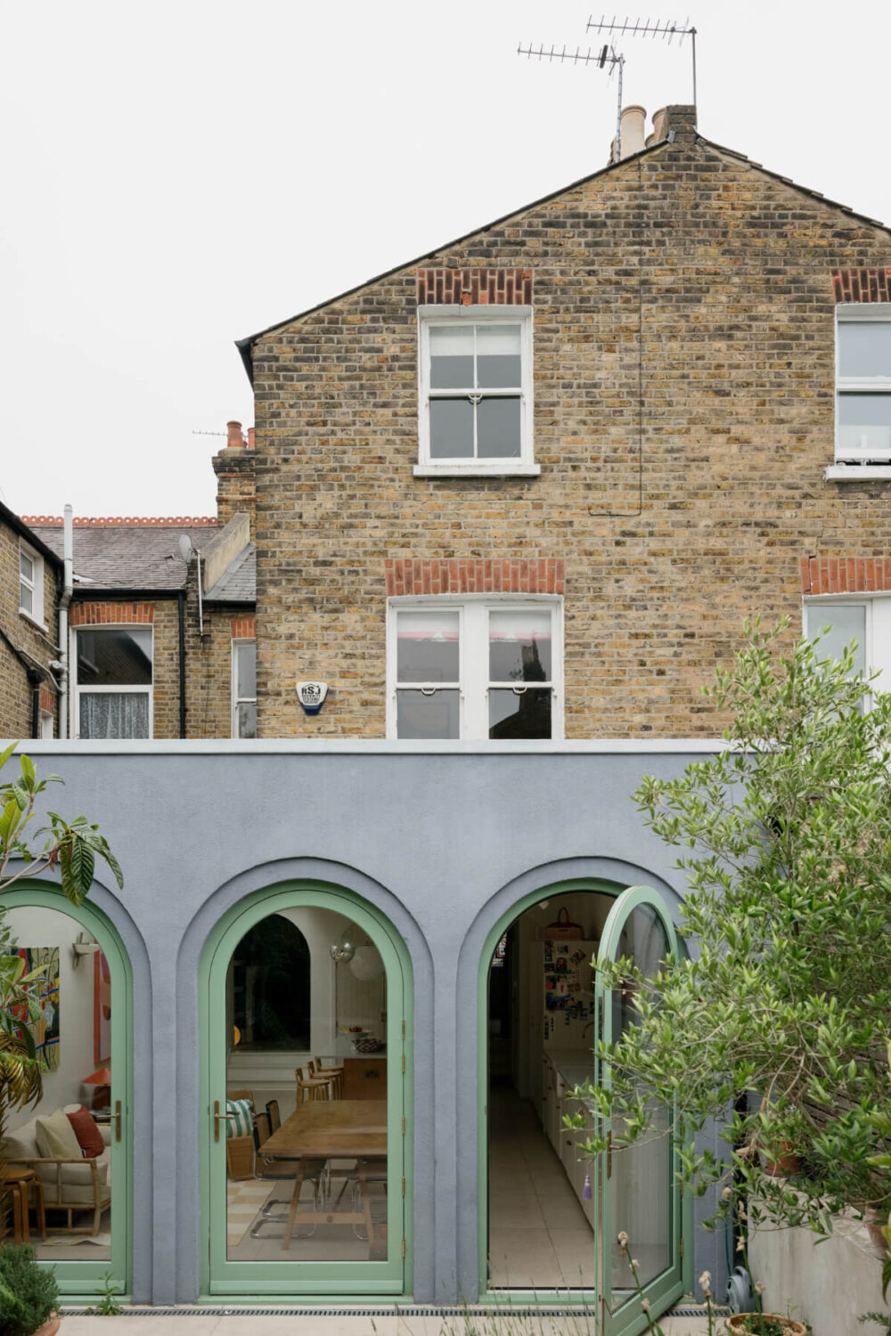 A Victorian Family House with a Tuscan-Inspired Kitchen Extension 15 exterior extension arched windows A Victorian Family House with a Tuscan-Inspired Kitchen Extension