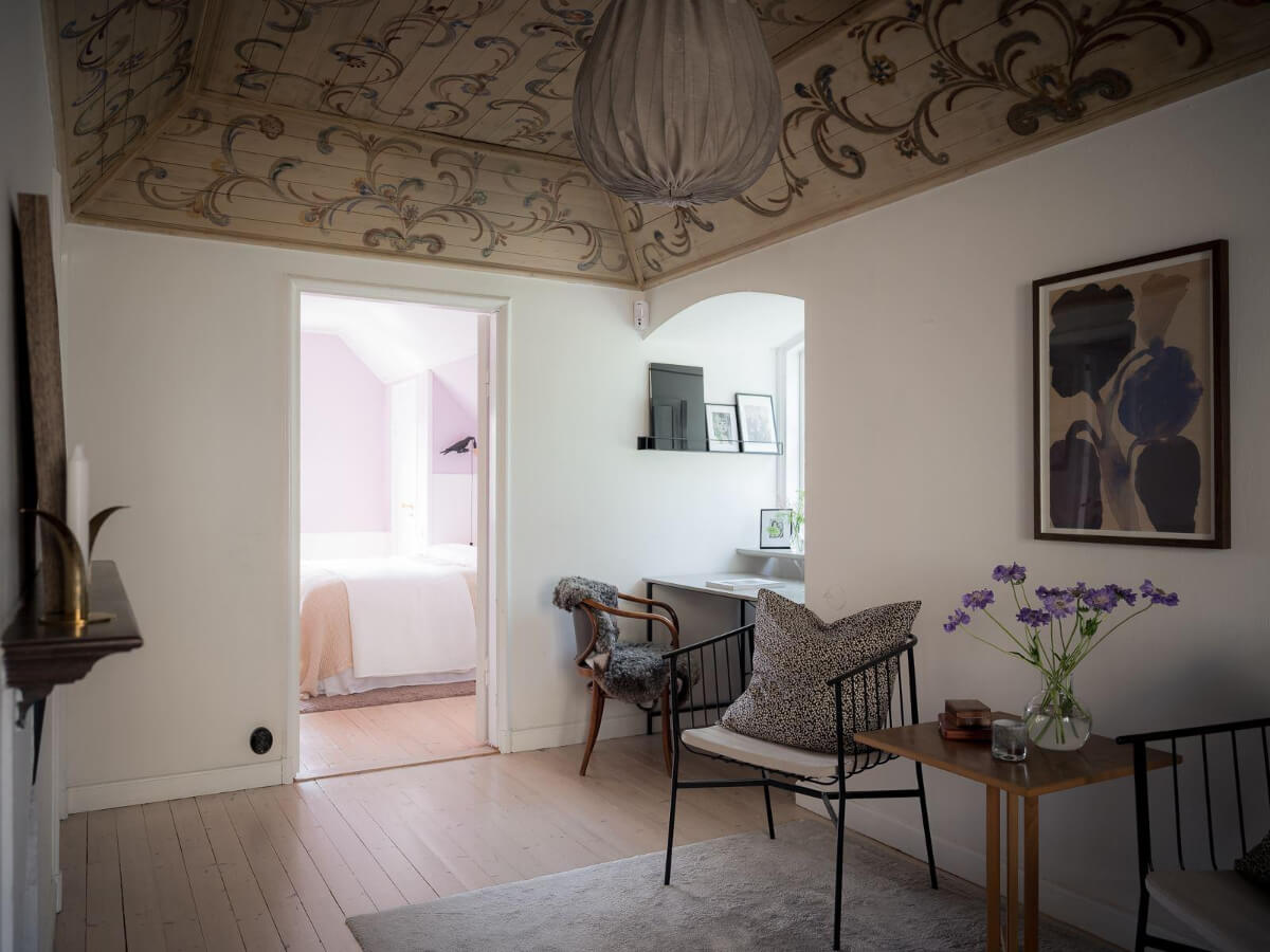 A Floral Painted Ceiling in a 1920s Family Home in Sweden 25 first floor landing painted wooden ceiling niche for desk