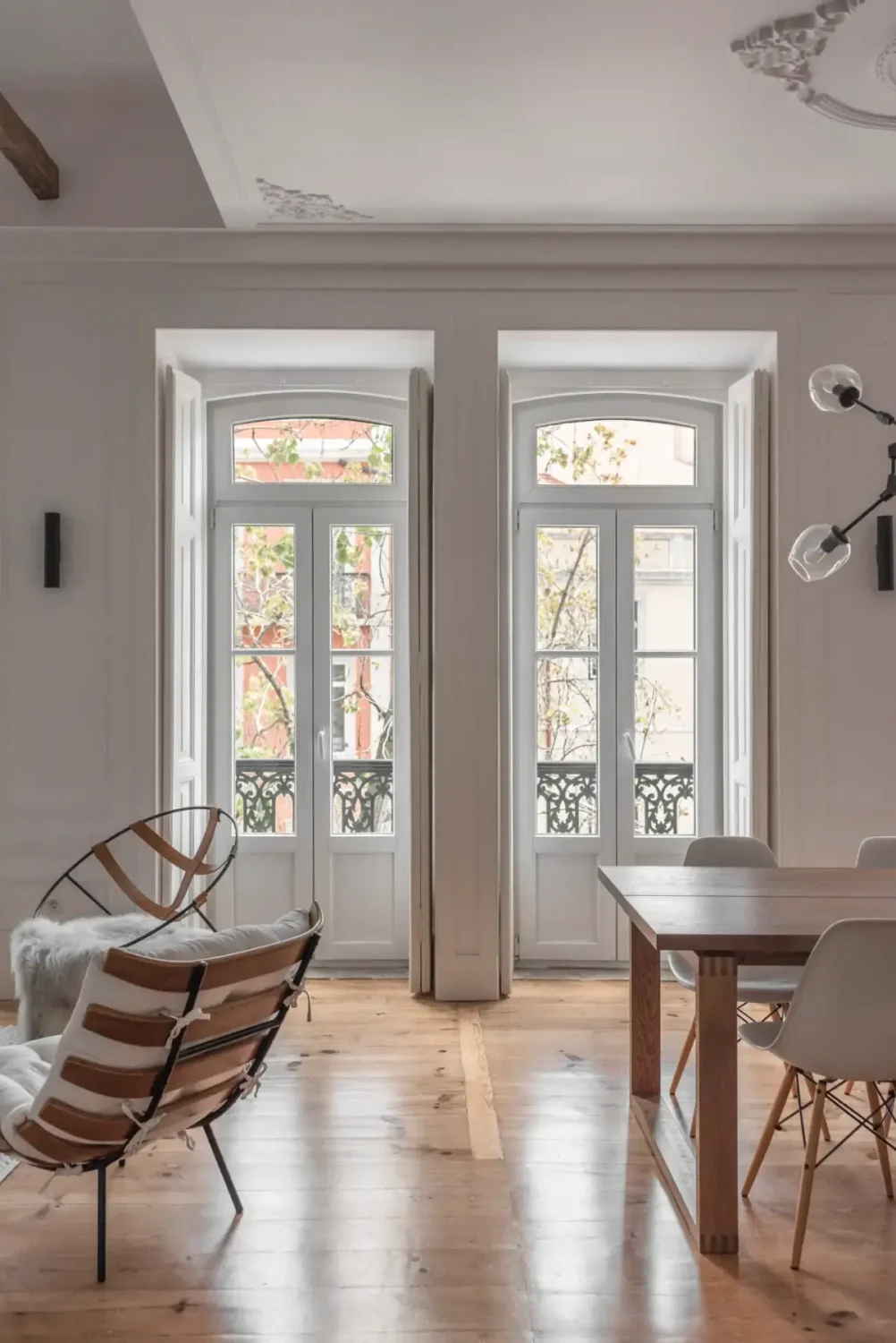 A Light-Filled Duplex Apartment in a Classical Lisbon Building 3 french doors lisbon apartment