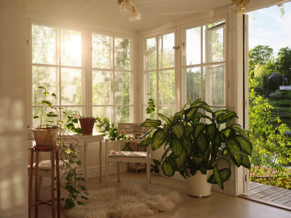 This Extended 19th Century Lakeside House is a Green Oasis in the City 11 garden room