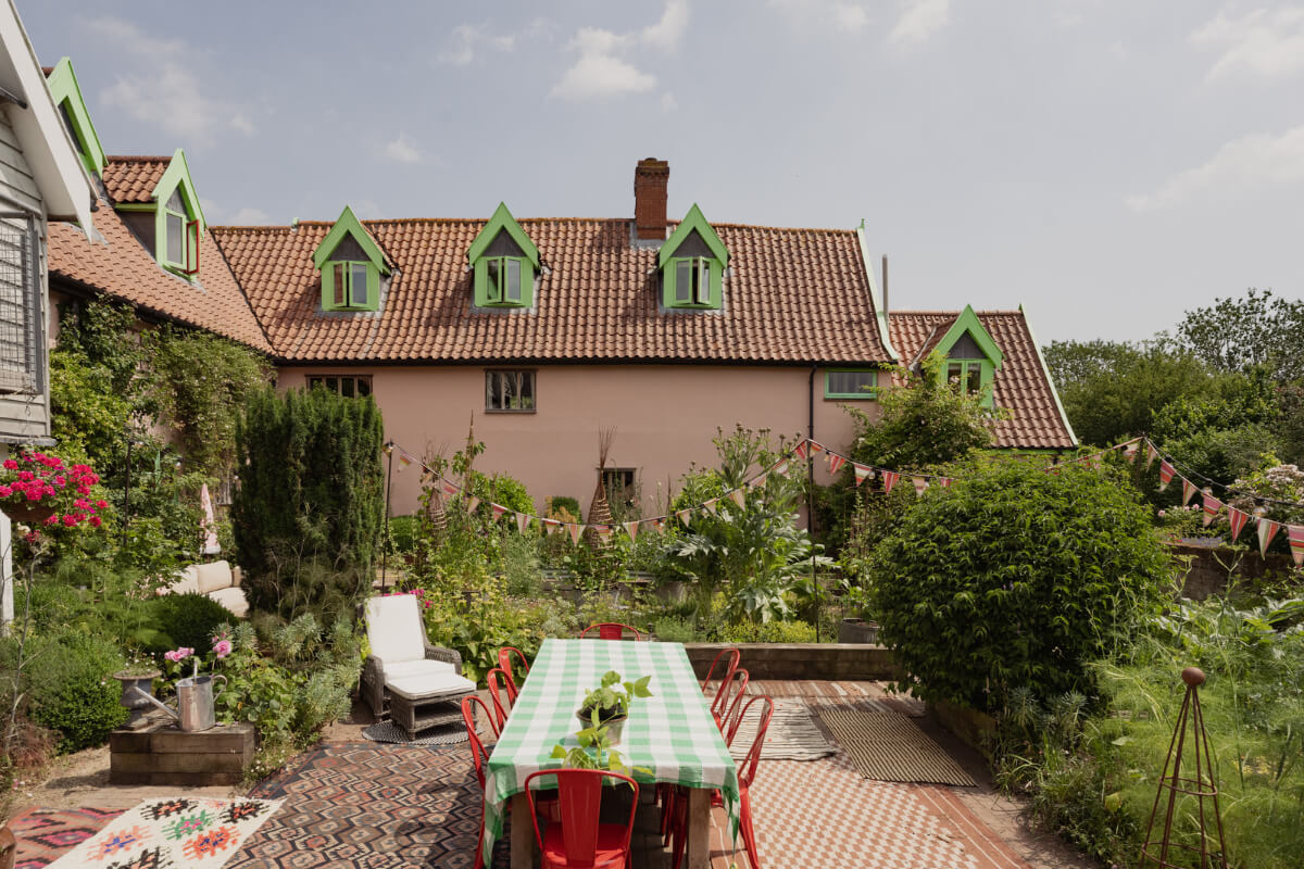 Colorful Interiors and Period Features in a 16th-Century Farmhouse 28 garden terrace pink country house
